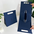 One-piece quick-fold rigid box (hand-bag version)